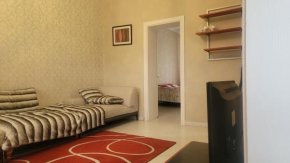A nicely furnished, cozy apartment next to the State Department Store